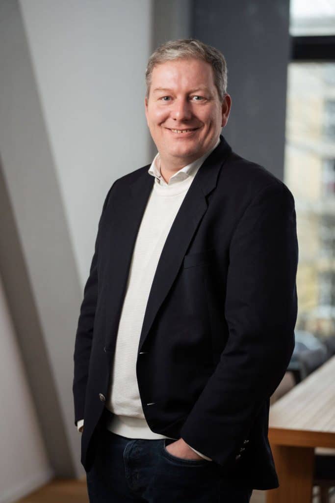 Portraitfoto von Martin Schad aus dem Troi-Team